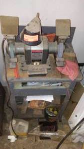 lot 283 image: Craftsman Grinder-polisher mounted on cabinet base.