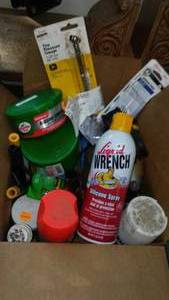 lot 392 image: Misc. cans of wax, liquid Wrench - almost full, and more.