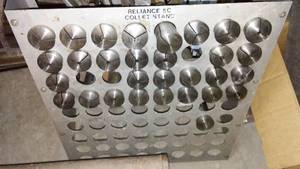 lot 411 image: Metal Collets and stand.