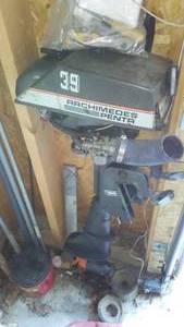 lot 486 image: 39cc Trolling motor.  Gas, 2 stroke with can and tool kit