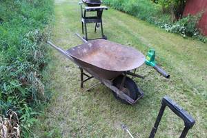 lot 618 image: Metal Wheelbarrow with Wood Handles