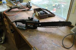 lot 668 image: Remington Limb N Trim 14 Electric Chain Saw