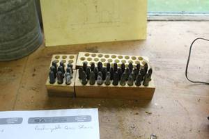 lot 675 image: Lot of (2) Metal Punch Sets  - Wood Case