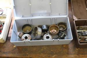 lot 705 image: Plastic Tool Box  with Hole Saw Drill Bits