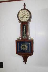 lot 755 image: Wall Clock - Banjo