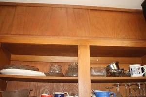 lot 806 image: Kitchenwares (on top shelf)  with Serving Platters, Serving Dishes, Coffee Mugs