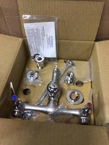 lot 37 image: Commander Wall Mount 2-Handle Bathroom Faucet in Rough Chrome Plated with Cross Handles Customer Returns See Pictures