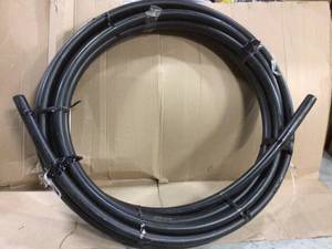lot 41 image: 2 in. x 100 ft. IPS 100 PSI UTY Poly Pipe Customer Returns See Pictures