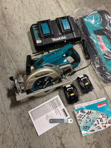 lot 102 image: 18-Volt X2 LXT Lithium-Ion (36-Volt) Brushless Cordless Rear Handle 7-14 in. Circular Saw with 2 - 5.0Ah Battery Pack by Makita