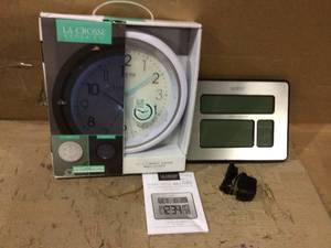 lot 55 image: 10 in. Night Vision Silent Sweep Quartz Analog Wall Clock