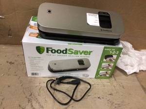 lot 64 image: FoodSaver Space Saving Vacuum Sealer - VS1120