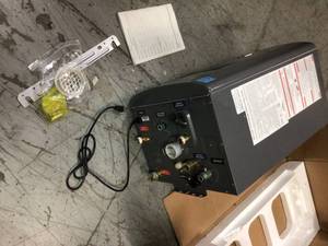 lot 114 image: Performance Platinum 11 GPM Natural Gas High Efficiency Indoor Recirculating Tankless Water Heater by Rheem