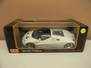 lot 19 image: VERY COOL 118 SCALE DIE-CAST - MAISTO SPECIAL EDITION FORD GT90. NEW IN BOX. GREAT PIECE - SEE PICTURES.
