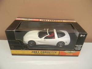 lot 25 image: 118 SCALE DIE-CAST - AMERICAN MUSCLE 2003 CORVETTE. NEW IN BOX. GREAT PIECE - SEE PICTURES.