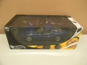 lot 34 image: 118 SCALE DIE-CAST - HOT WHEELS METAL COLLECTION BLUE CORVETTE. NEW IN BOX. GREAT PIECE - SEE PICTURES.