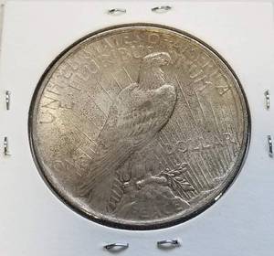lot 27 image: 1924 PEACE SILVER DOLLAR NICE COLOR UNC