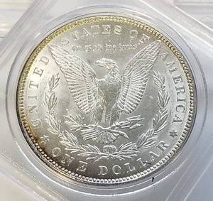 lot 54 image: 1889 MORGAN SILVER DOLLAR AU58