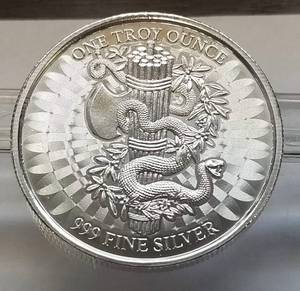 lot 37-A image: 1 TROY OZ. .999 FINE SILVER E PLURIBUS UNUM ROUND