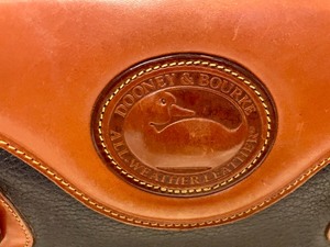 lot 51 image: Dooney & Bourke All Weather Leather Purse