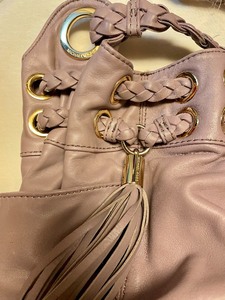 lot 46 image: Lavender Michael Kors Purse