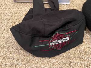 lot 141 image: Harley Davidson Books and Headwear