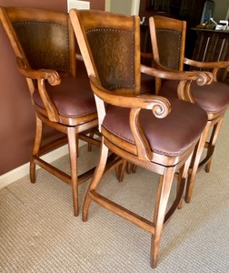 lot 183 image: 4 Artistica Wooden Swivel Bar Chairs with Metal Embossed Decorative Backs