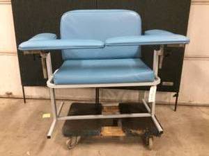 lot 15 image: MSRP $1200 CCI Phlebotomy Blood Draw Bariatric Chair - Excellent Condition
