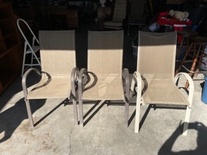 lot 18 image: Six Stackable Patio Sling Chairs