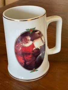 lot 38 image: Christmas Coca Cola Mugs 1996 Collection