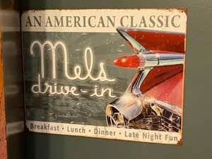 lot 92 image: An American Classic Mels Drive-In Tin Sign