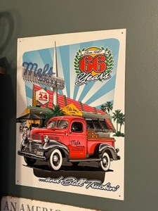 lot 93 image: Mels Drive-In Tin Sign