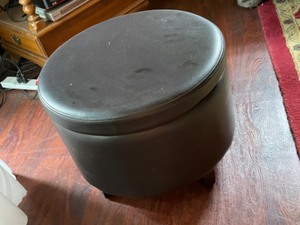 lot 149 image: Black Ottoman