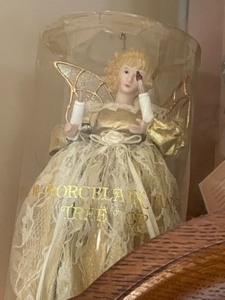 lot 226 image: Dolls New in Box on Top of Curio Cabinet