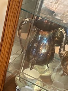 lot 230 image: Angel, Vintage Teapots on Fourth Shelf of Curio Cabinet