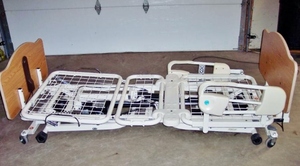 lot 10 image: MSRP $3500 JOERNS ULTRA CARE BED MULTI POSITIONAL HI & VERY LOW LONG TERM PATIENT CARE ADJUSTABLE BED WHAND REMOTE...INCLUDES FREE HIGH QUALITY (RESISTS BED SORES) MATTRESS EXCELLENT WORKING CONDITION