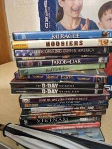 lot 243 image: Over-the-Door Speedbag, DVDs, Water Bottles & More
