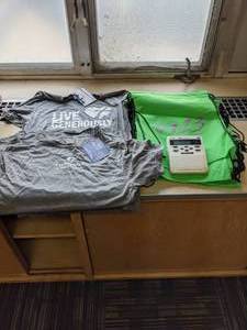 lot 245 image: NOAA Weather Radio & Promotional T-shirtsBackpacks