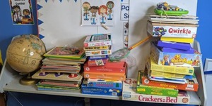 lot 161 image: Games, Puzzles, Toys, & Globe Qwirkle, Hooked on Phonics, Crackers in my Bed, Good Night Moon, & More