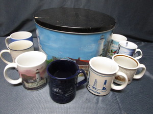 lot 99 image: Lighthouse Cups & Tin