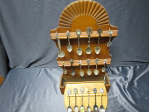 lot 104 image: Spoons  Holders
