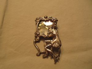 STERLING PIN OF A WOMAN AT THE MIRROR