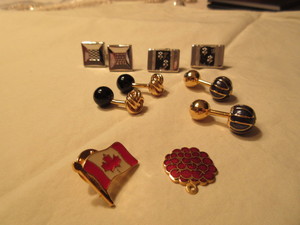 FOUR PAIR OF CUFF LINKS AND CHARMS
