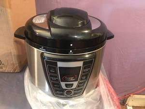 lot 3 image: New Power Pressure Cooker Pro