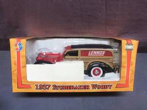 lot 26 image: Lennox 1937 Studebaker Woody Die Cast