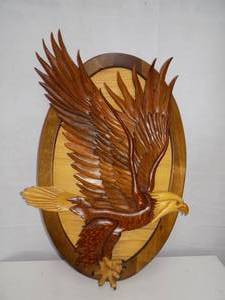 lot 11 image: Handcrafted Eagle Out of Wood