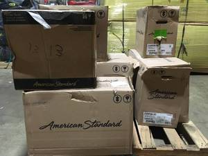 Pallet with 3 American Std  Toilets  in good condition see pictures