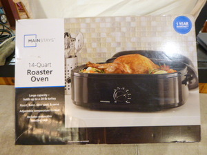 lot 31 image: New Mainstays 14 Quart Roaster Oven
