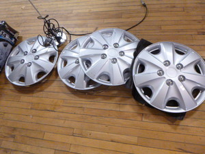 lot 129 image: Set of 14 Wheel Covers