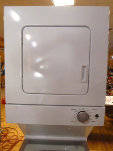 lot 2 image: Whirlpool Stacked WasherDryer - New Scratch and Dent
