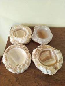 Four Carved Onyx Ash Trays